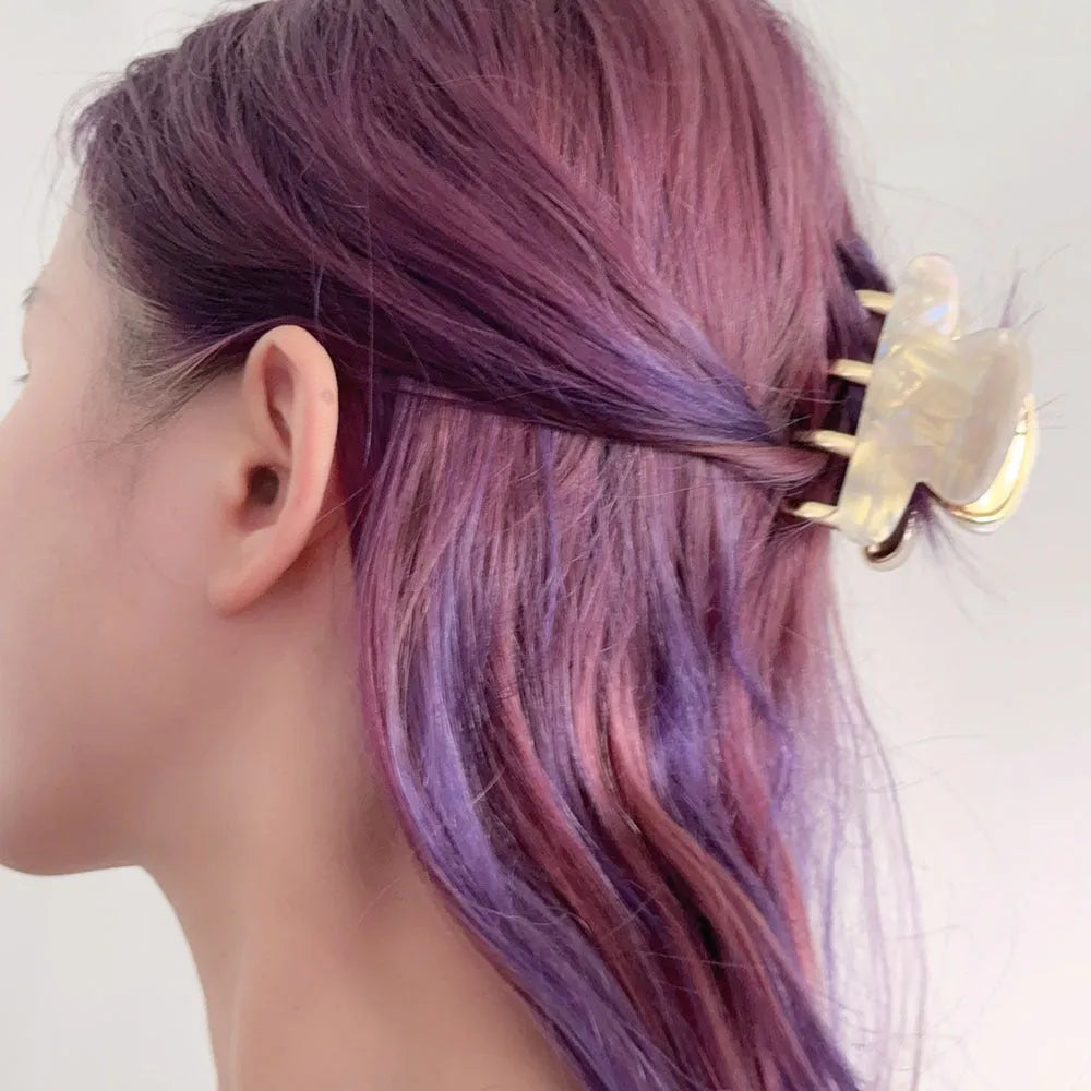 Women's retro acetate barrettes with metal grip in four colour variations including leopard print