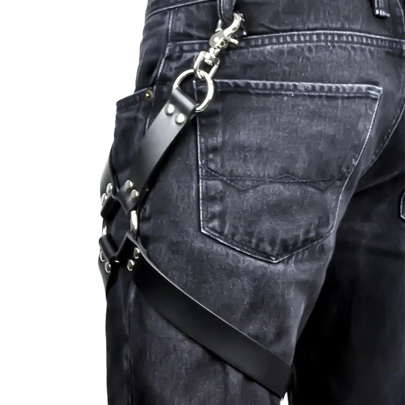 Black PU leather women's leggings on a hanger.