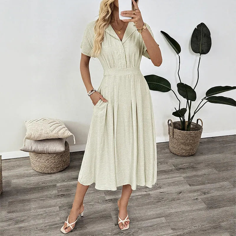 Light green lapel collar shirt dress with waist-tight skirt and commuter pockets