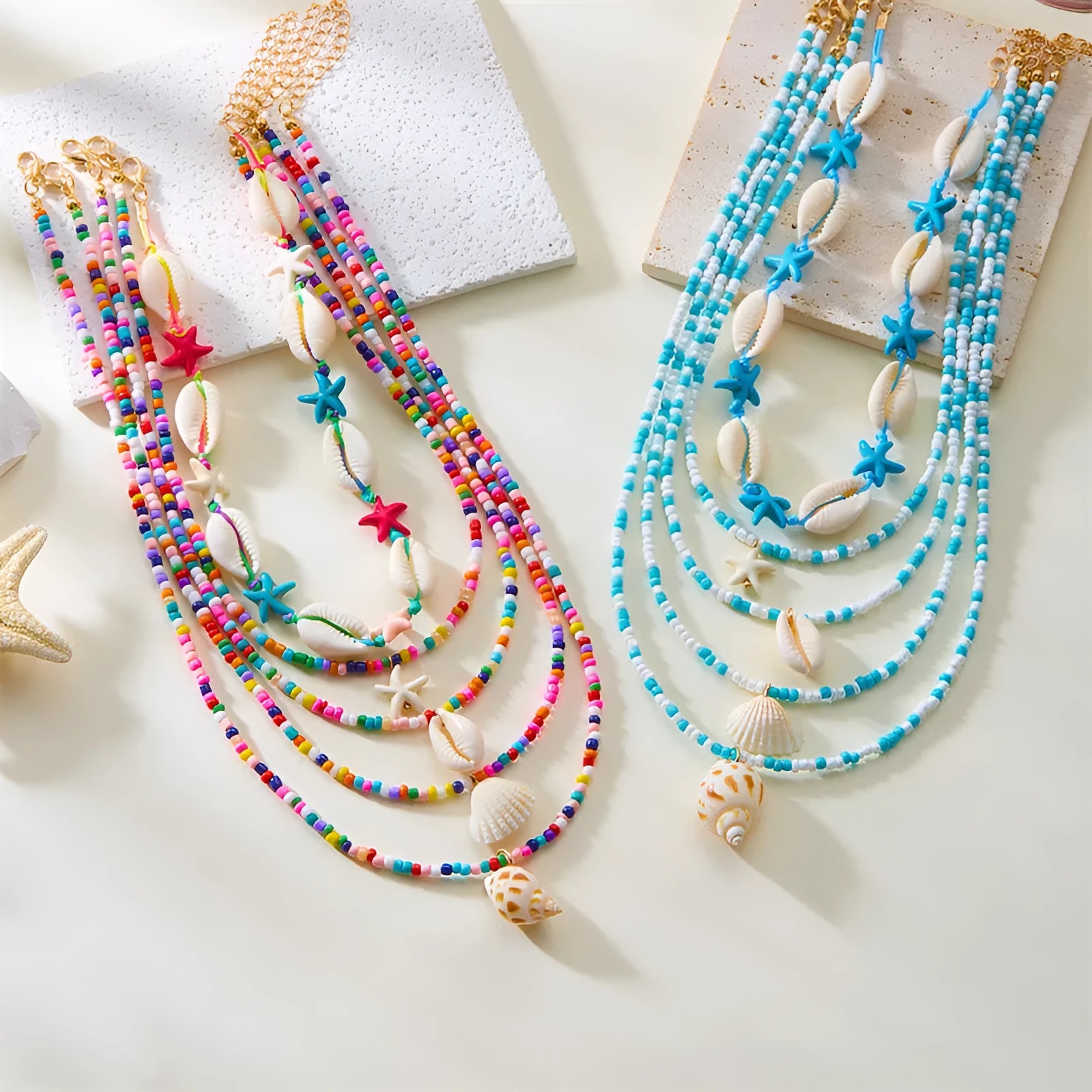 Women's multi-layer necklace set with starfish and shell pendants in blue and assorted colours