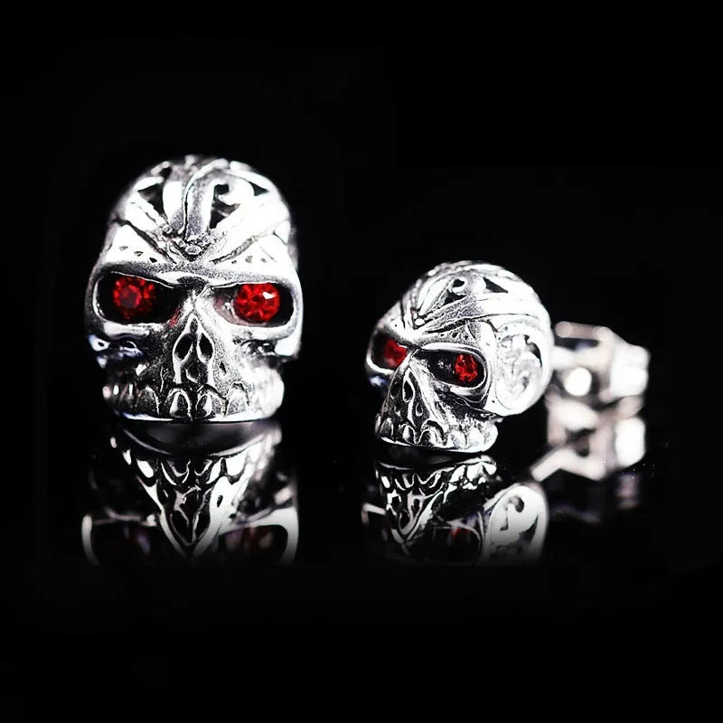 Retro style skull stud earrings with red eye ghost head design on alloy backing