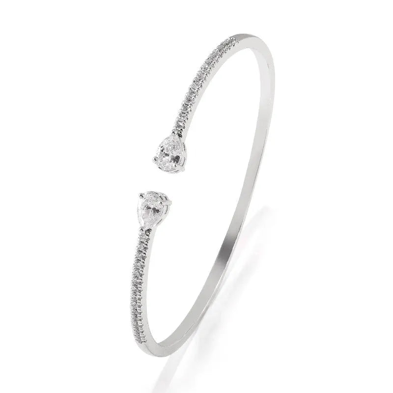 Copper bracelet with inlaid white or blue zircon crystals, simple fashion jewellery design