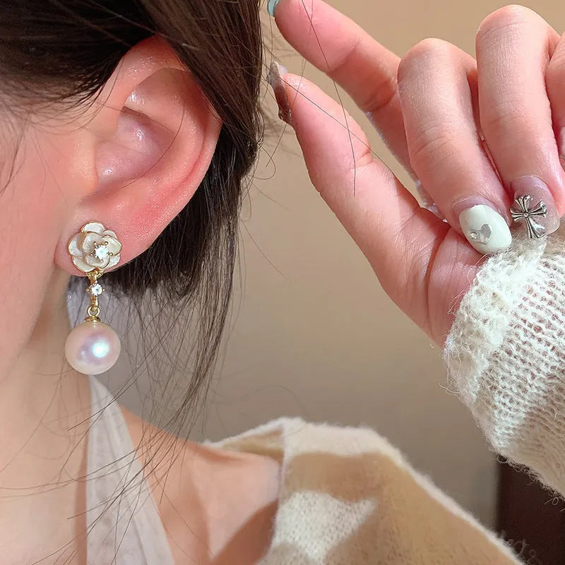 Camellia flower stud earrings for women in alloy metal with floral design