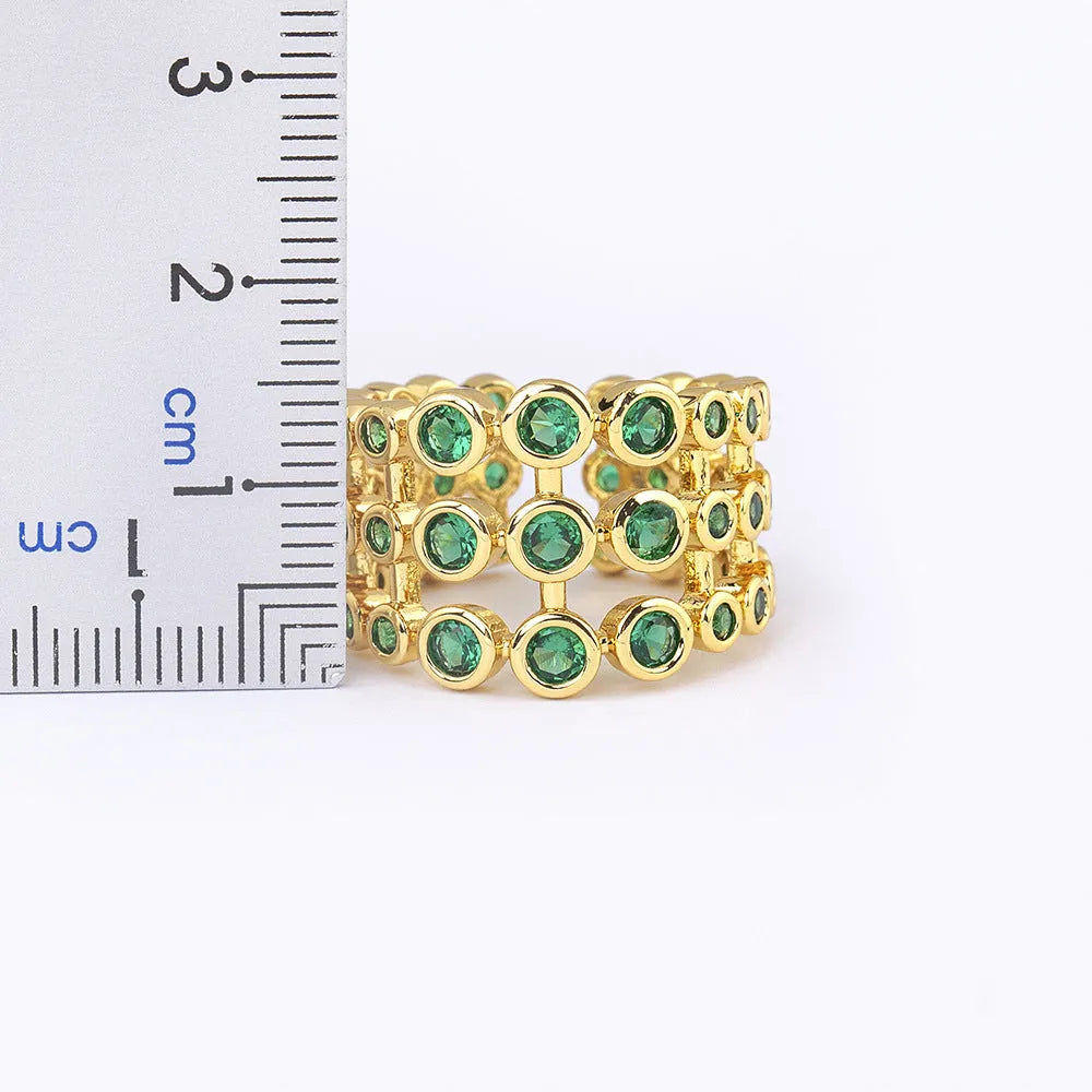 Copper ring with 18K gold plating and three-layer green zircon design in wide band version