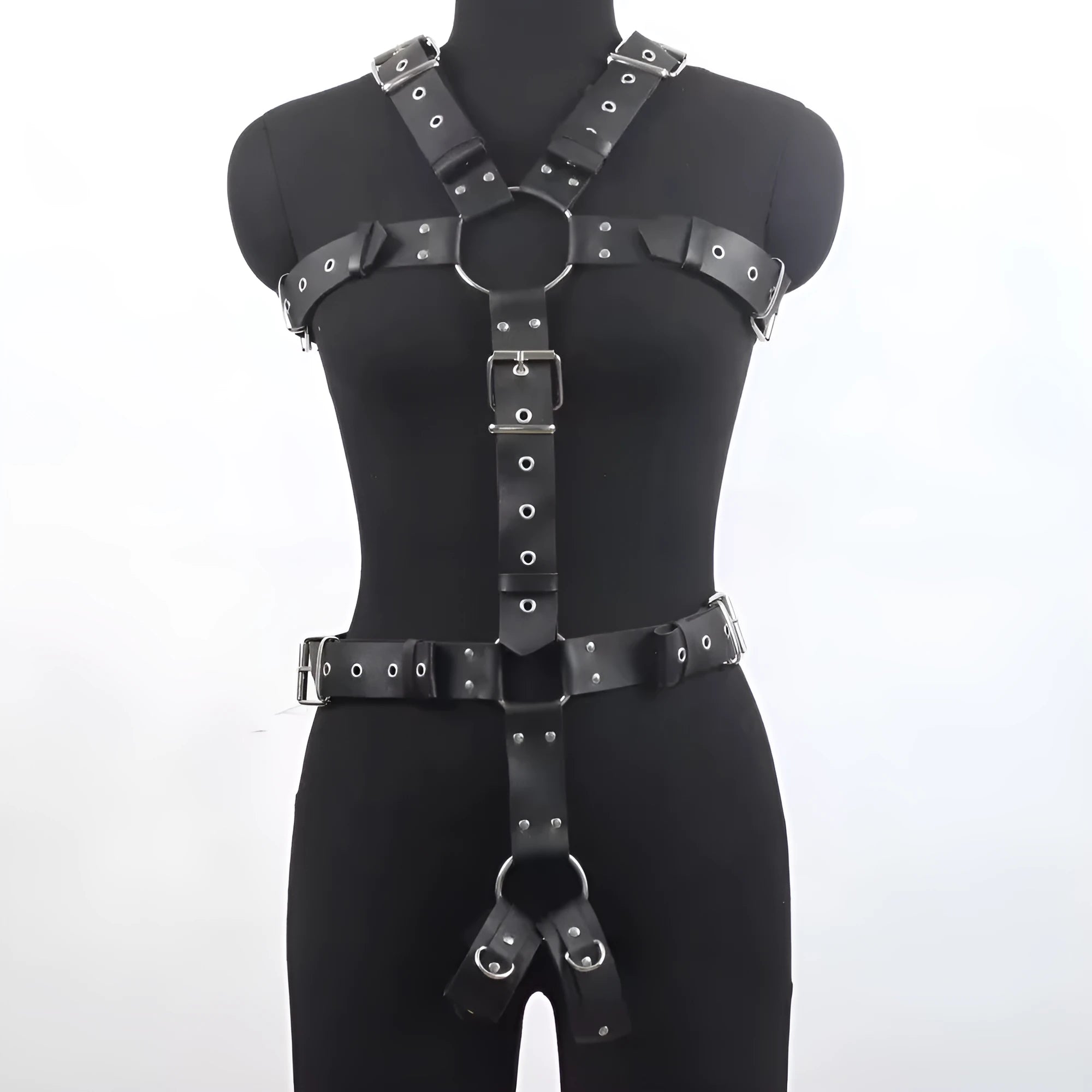 Black patent leather waist cincher shapewear with pin buckle fastening on mannequin
