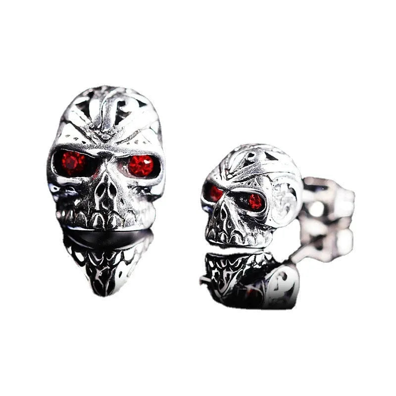 Retro style skull stud earrings with red eye ghost head design on alloy backing