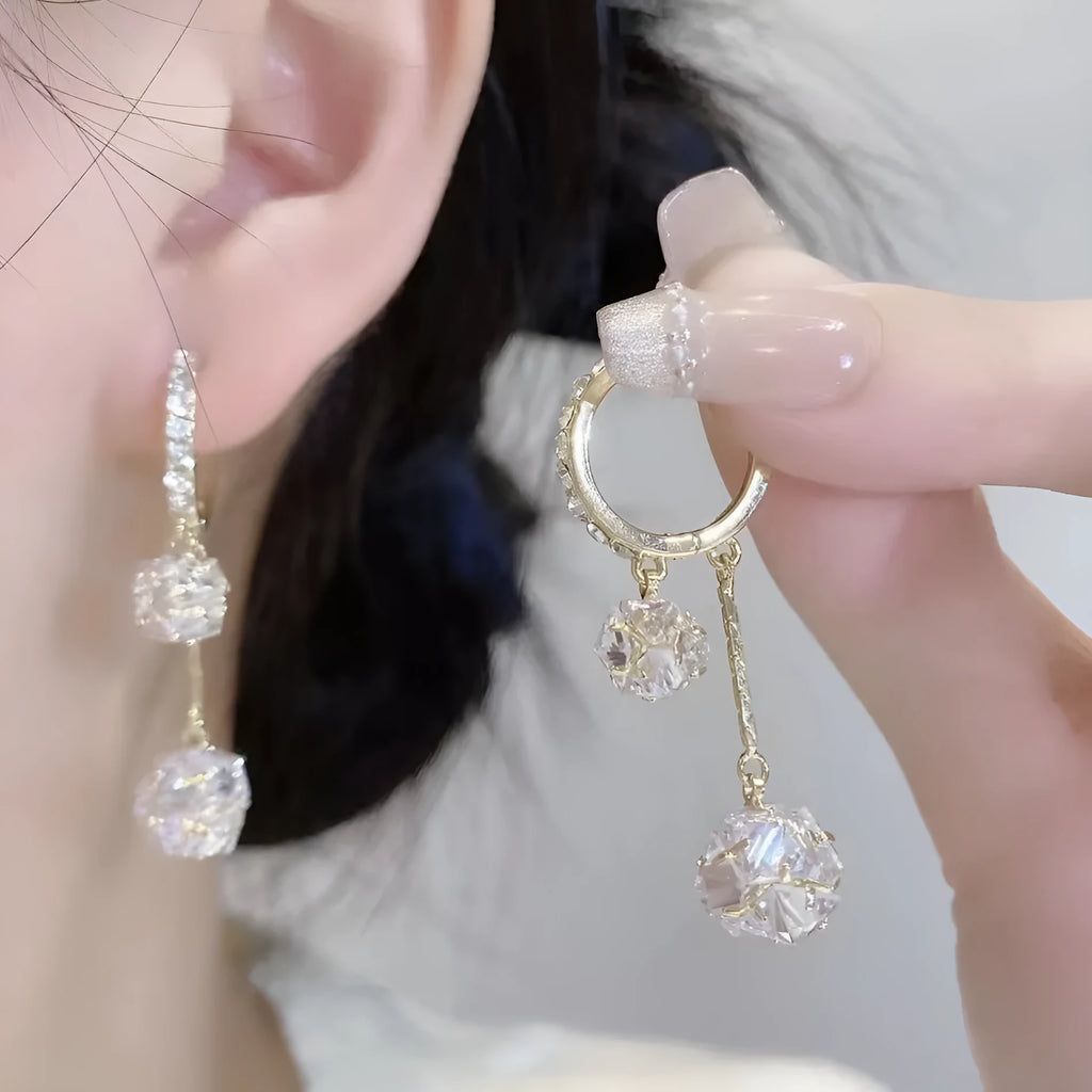 Silver drop shape women's earrings with rhinestone ball and tassel pendant designs