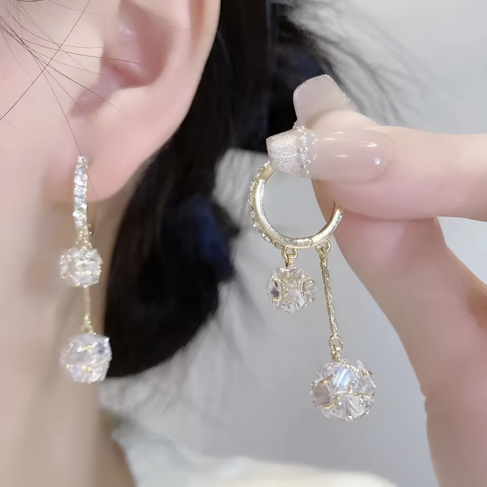 Silver drop shape women's earrings with rhinestone ball and tassel pendant designs