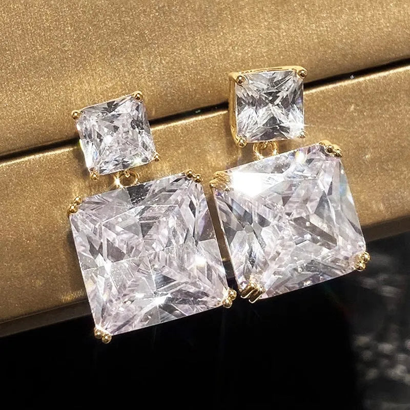 Geometric square copper earrings with gold finish and quadrilateral design