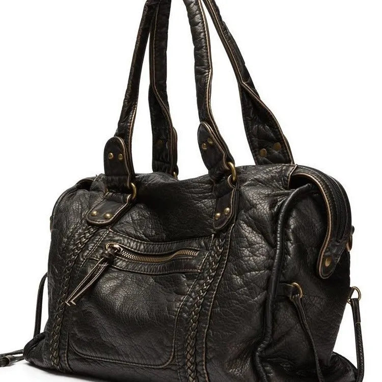 Women's French retro motorcycle style messenger shoulder bag in soft PU leather with woven detailing