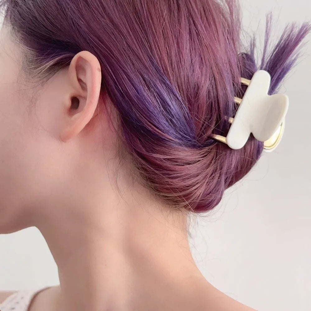 Women's retro acetate barrettes with metal grip in four colour variations including leopard print