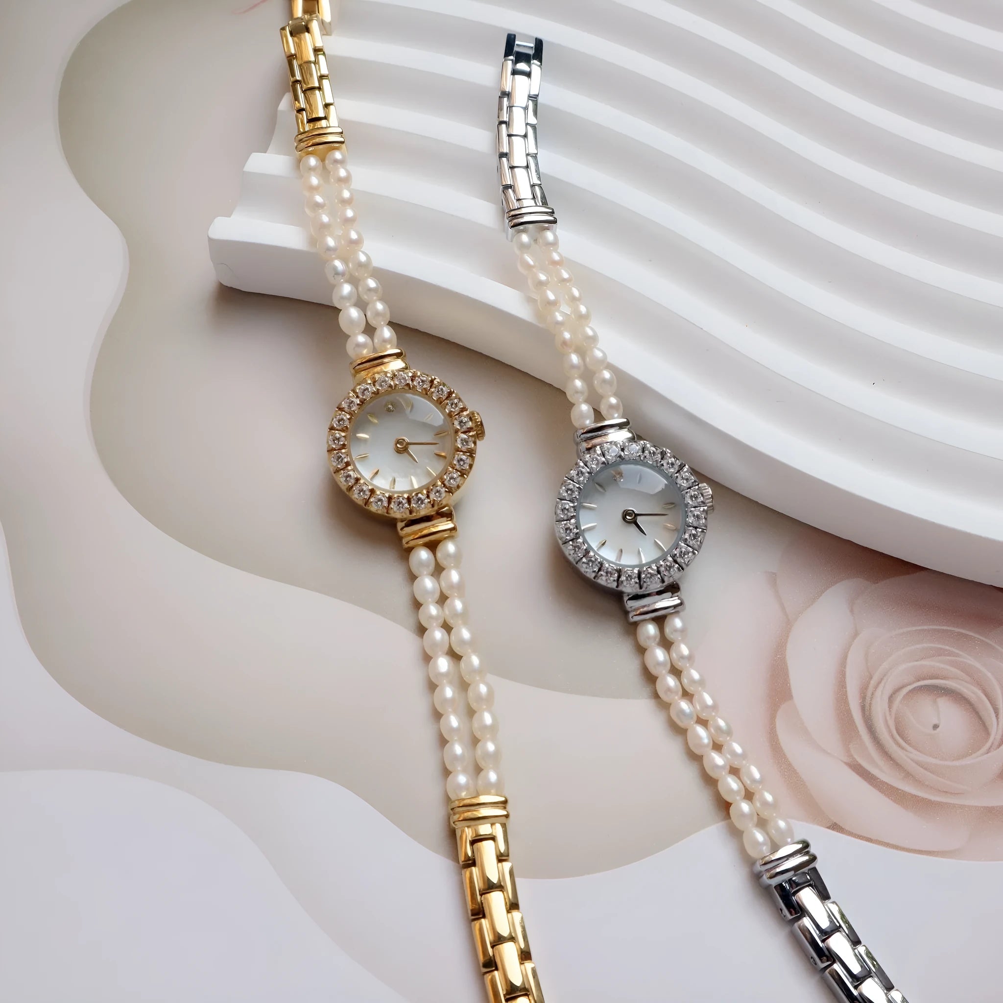 Women's light gold bracelet watch with freshwater pearls and round 18mm dial