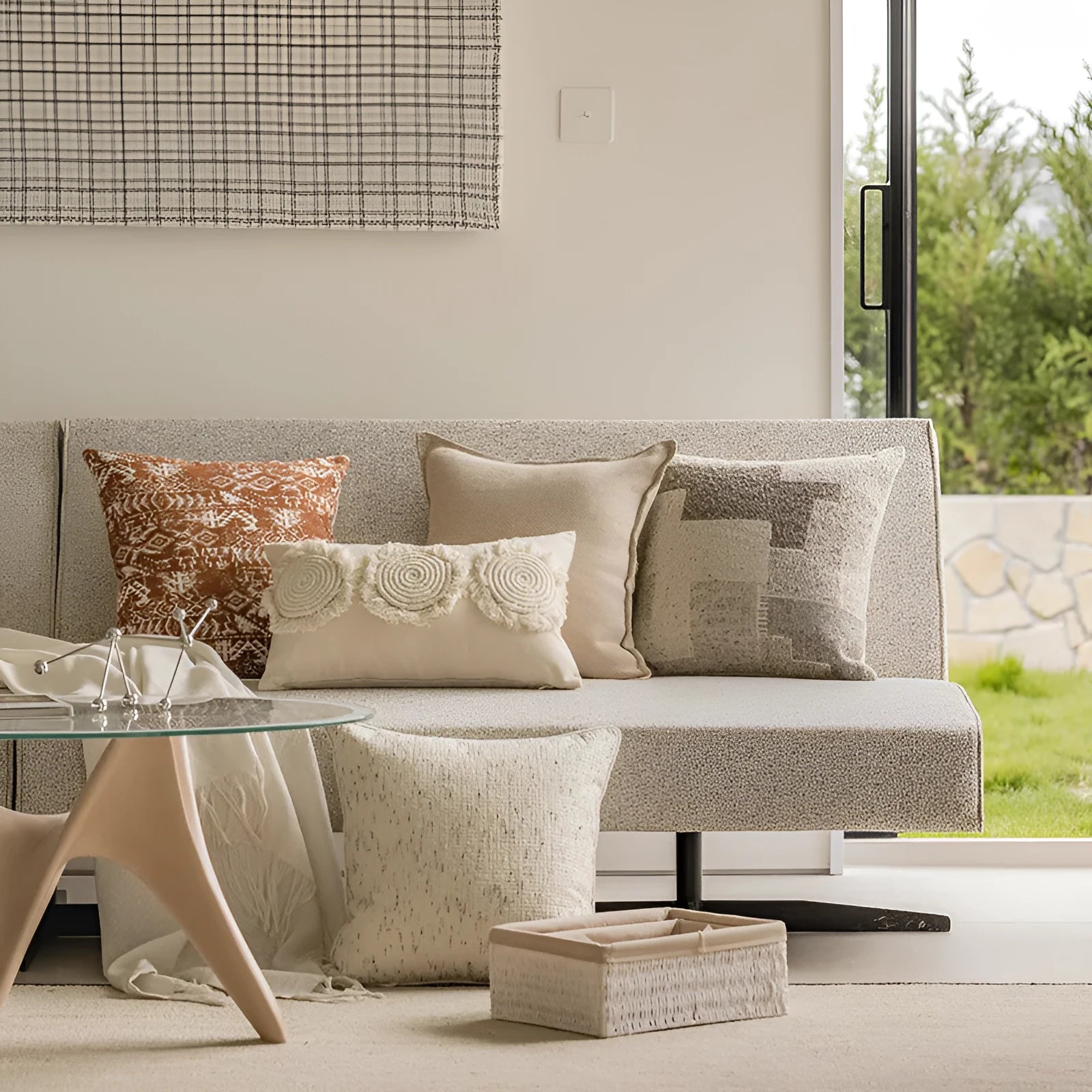 Solid colour decorative cushion on a grey sofa, showing red coffee brown and plain colour options.