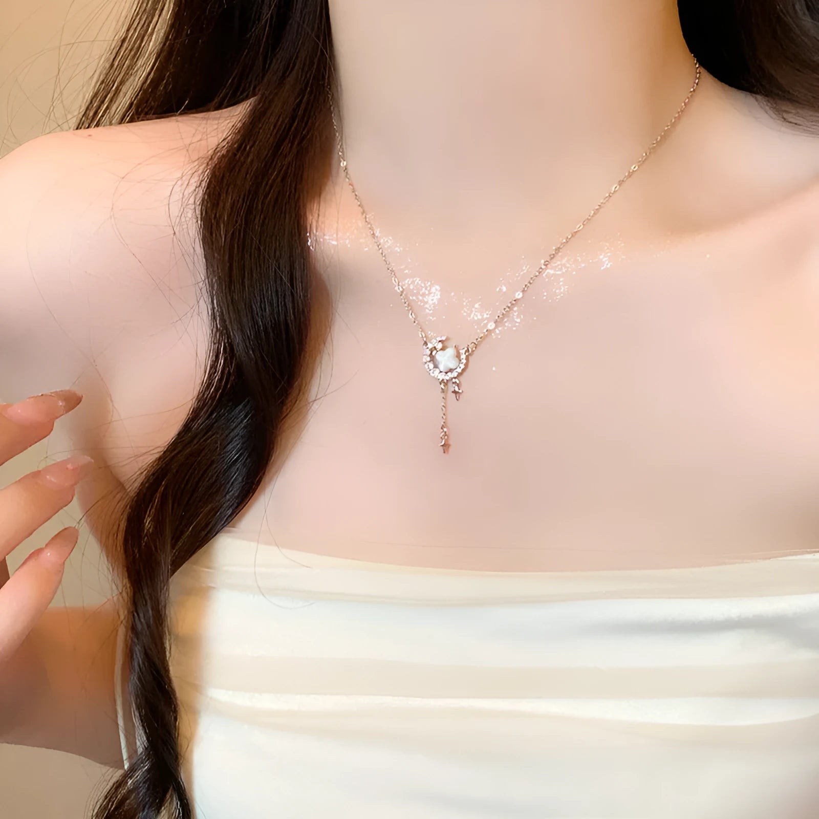 Gold and silver star moon necklace with zirconium diamonds on adjustable clavicle chain
