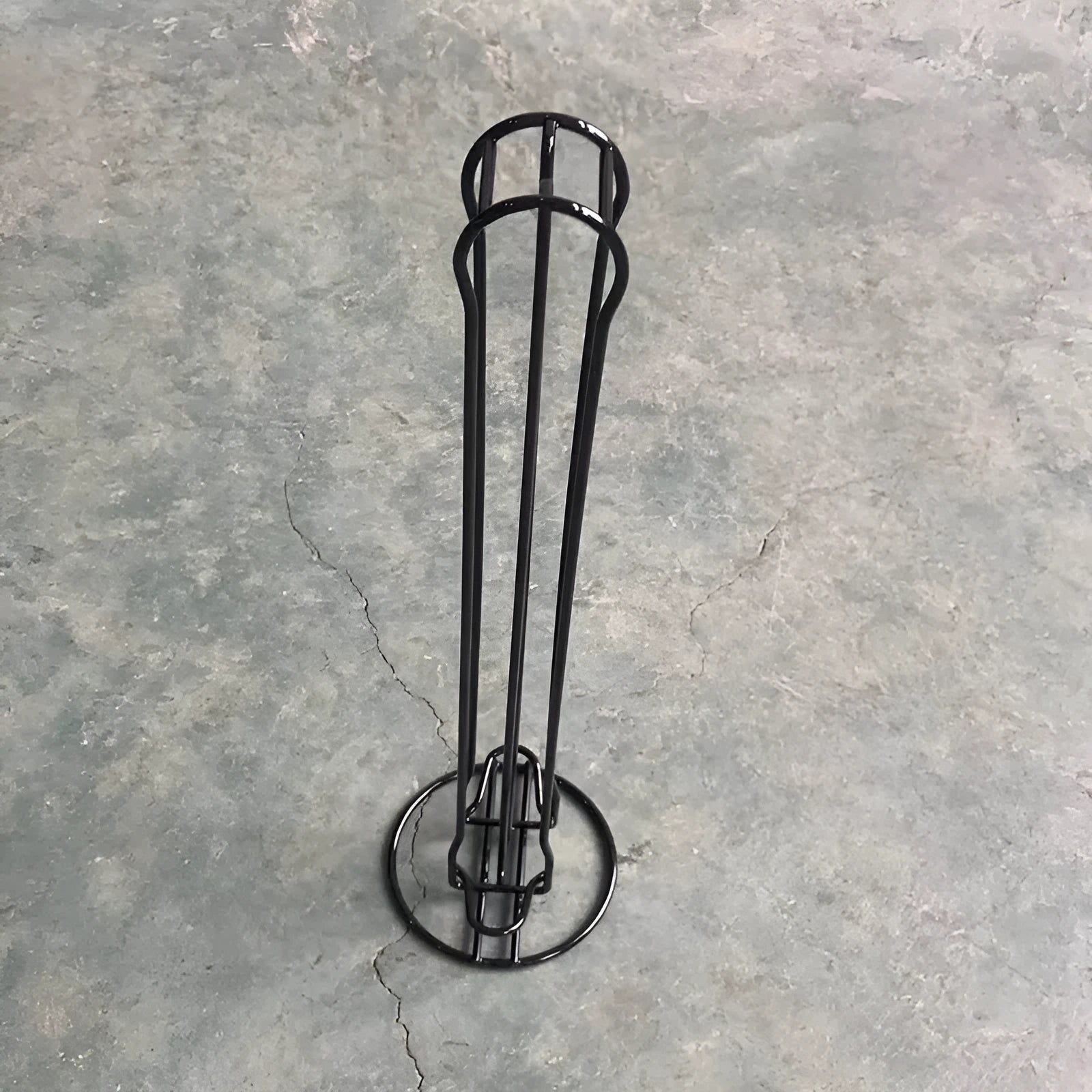 Wrought iron coffee capsule storage rack holding 20 pods in modern simple style
