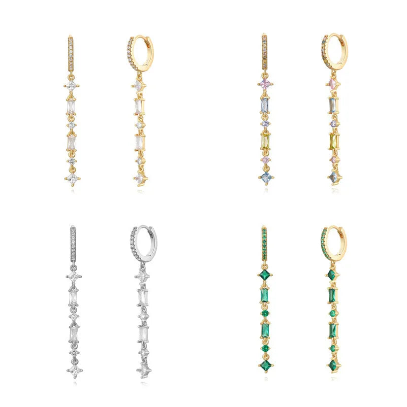 Geometric U-shaped ear clips with colourful zircon detailing in gold and white variations