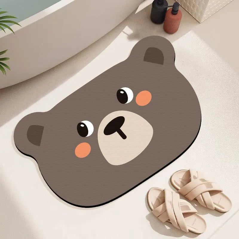 Diatomite absorbent bathroom mat with cartoon animal design in one of three available sizes
