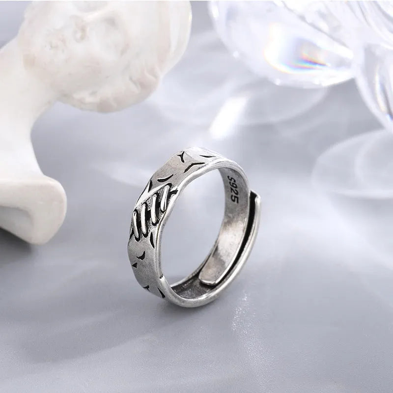 Black geometric adjustable copper ring with oval elements for women's fashion jewellery