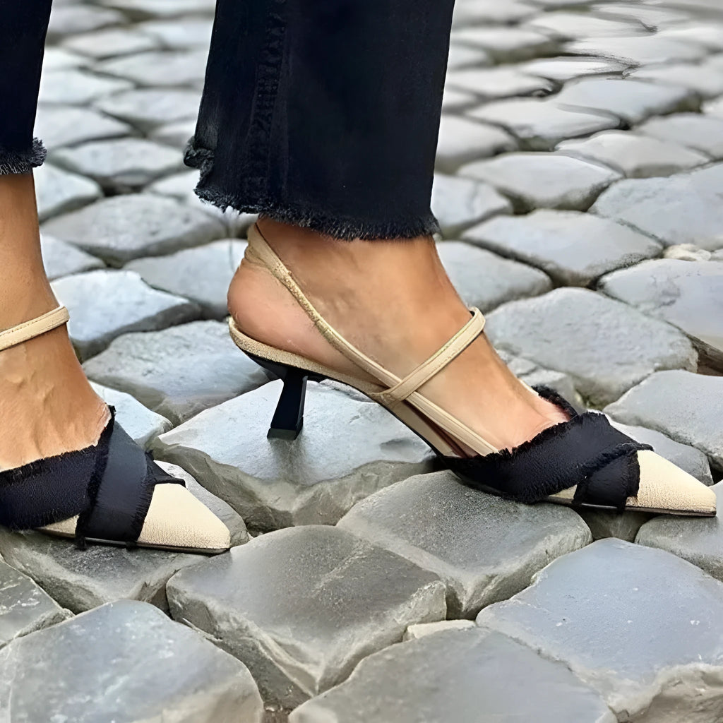 Apricot black colour block women's stiletto heel sandals with pointed toe and ankle buckle.