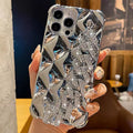 iPhone case with chain design and diamond bracelet wrist strap in silver or gold finish
