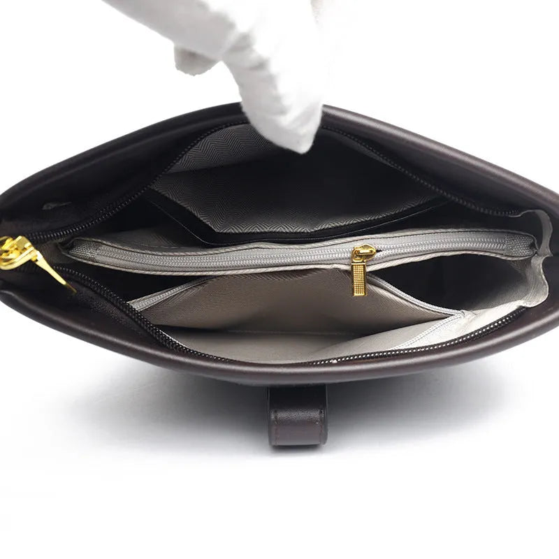 Korean style black PU bucket messenger bag with organised interior compartments and double shoulder straps