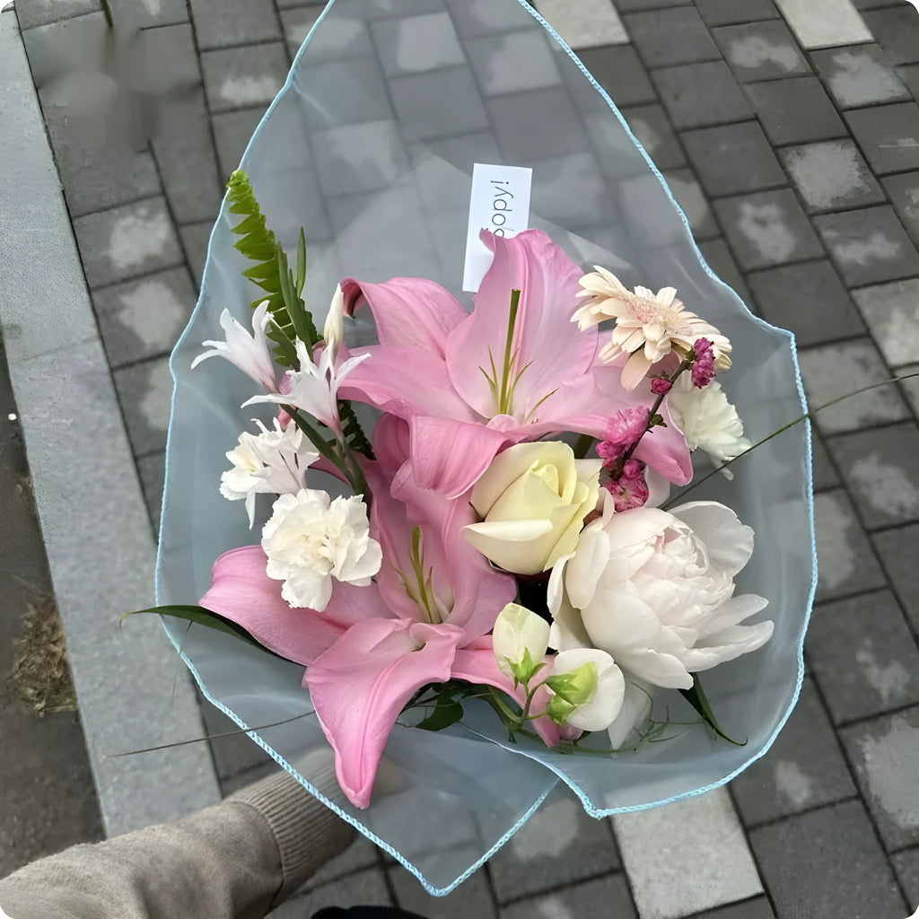 Two square pieces of silk fabric for wrapping flower bouquets, shown in assorted colours.