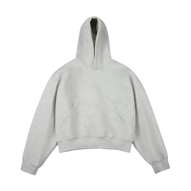Man wearing a dark grey Chinese cotton hooded sweatshirt with a removable hood and long sleeves.