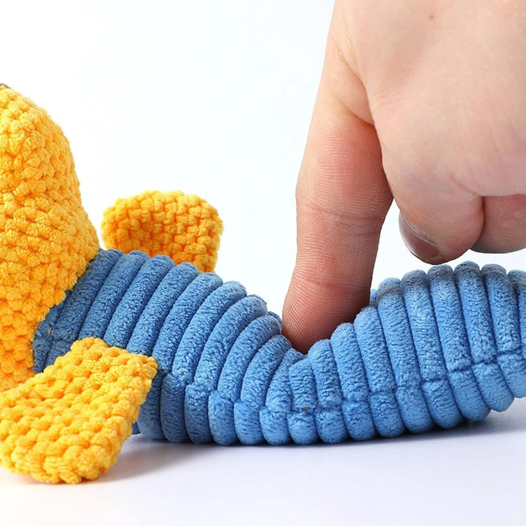 Dog squeaky chew toy in stuffed animal shape for dental cleaning and teething relief
