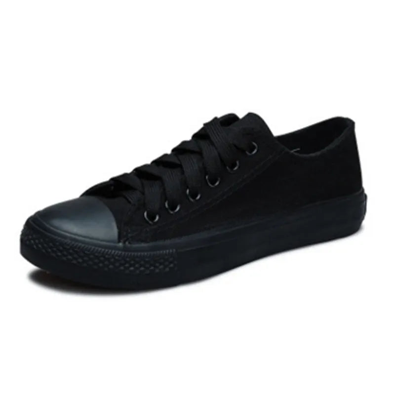 Women's solid colour canvas summer shoes available in black, white black, white red, and all black colour options.