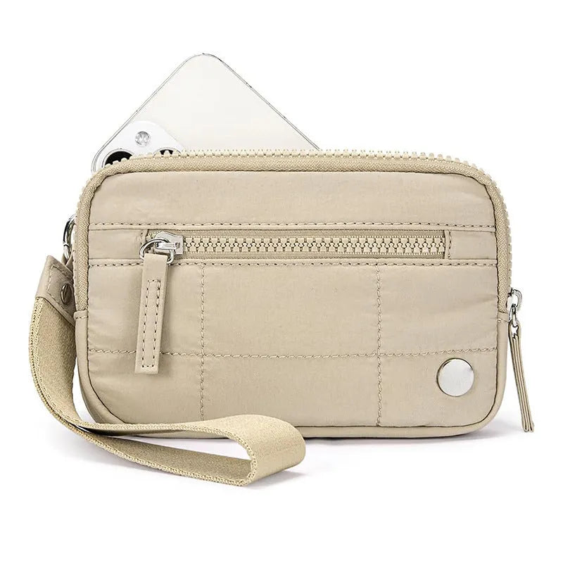 Waterproof quilted women's handbag with transparent deck compartment in nylon material