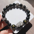 Men's Silverstone bracelet with beads and engraved Chinese proverbs, shown in silver colour.