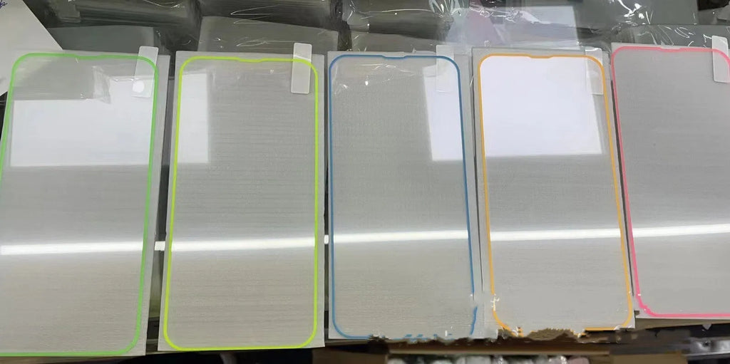 Fluorescent luminous tempered glass screen protector for iPhone on a phone.