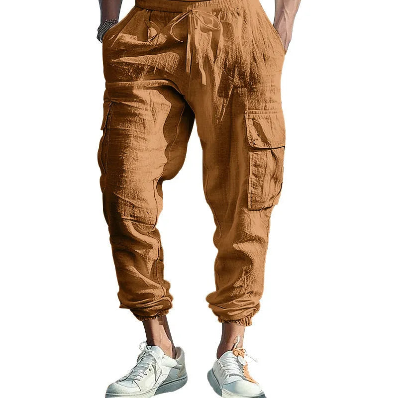 Men's loose linen trousers with ankle tie closure in army green colour.