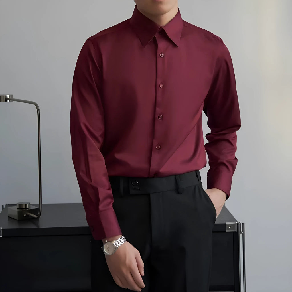 Man wearing a black Japanese retro style loose-fit long sleeve cardigan shirt.