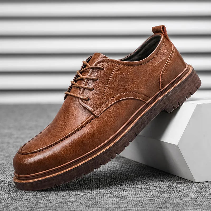 Men's brown casual leather slip-on shoes with round toe and rubber sole