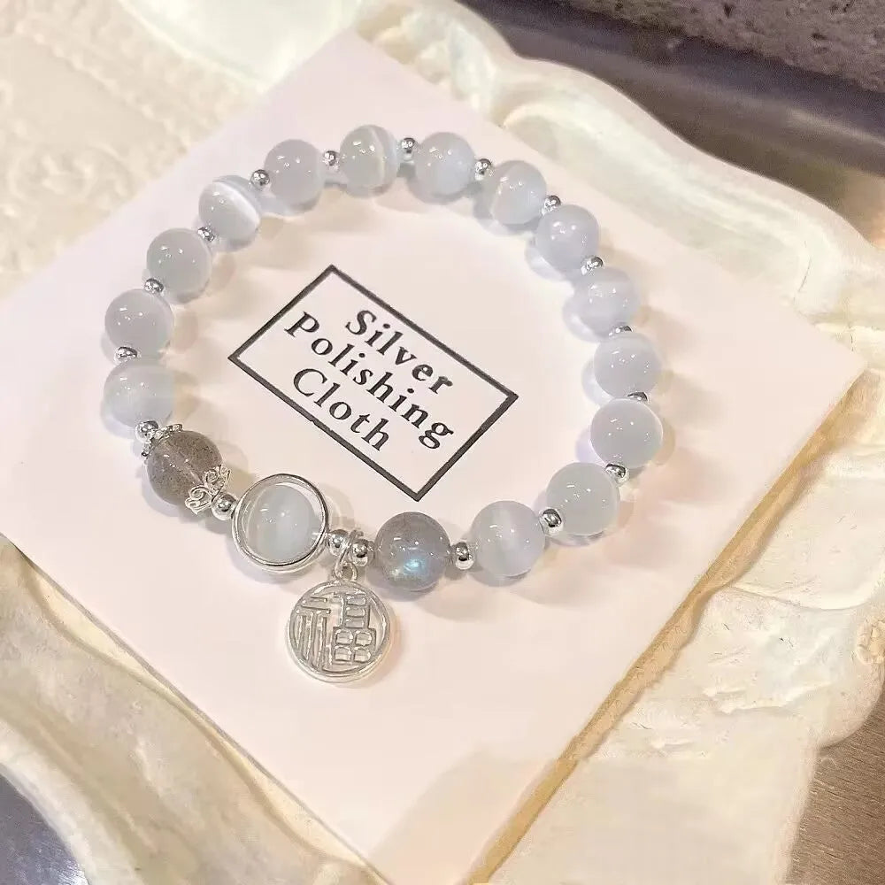 Glass butterfly bracelet for women with drop shape design and round beads in moonlight gray colour