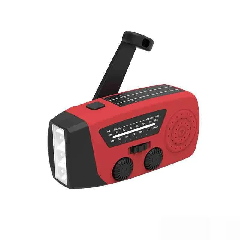 Red rechargeable emergency hand radio torch with built-in speaker and USB charging port