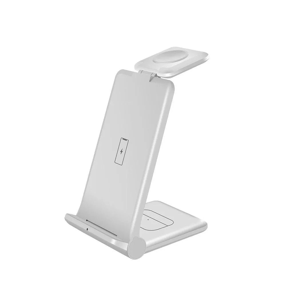 White 3-in-1 foldable wireless charging station dock for phone, AirPods, and Apple Watch on a desk.