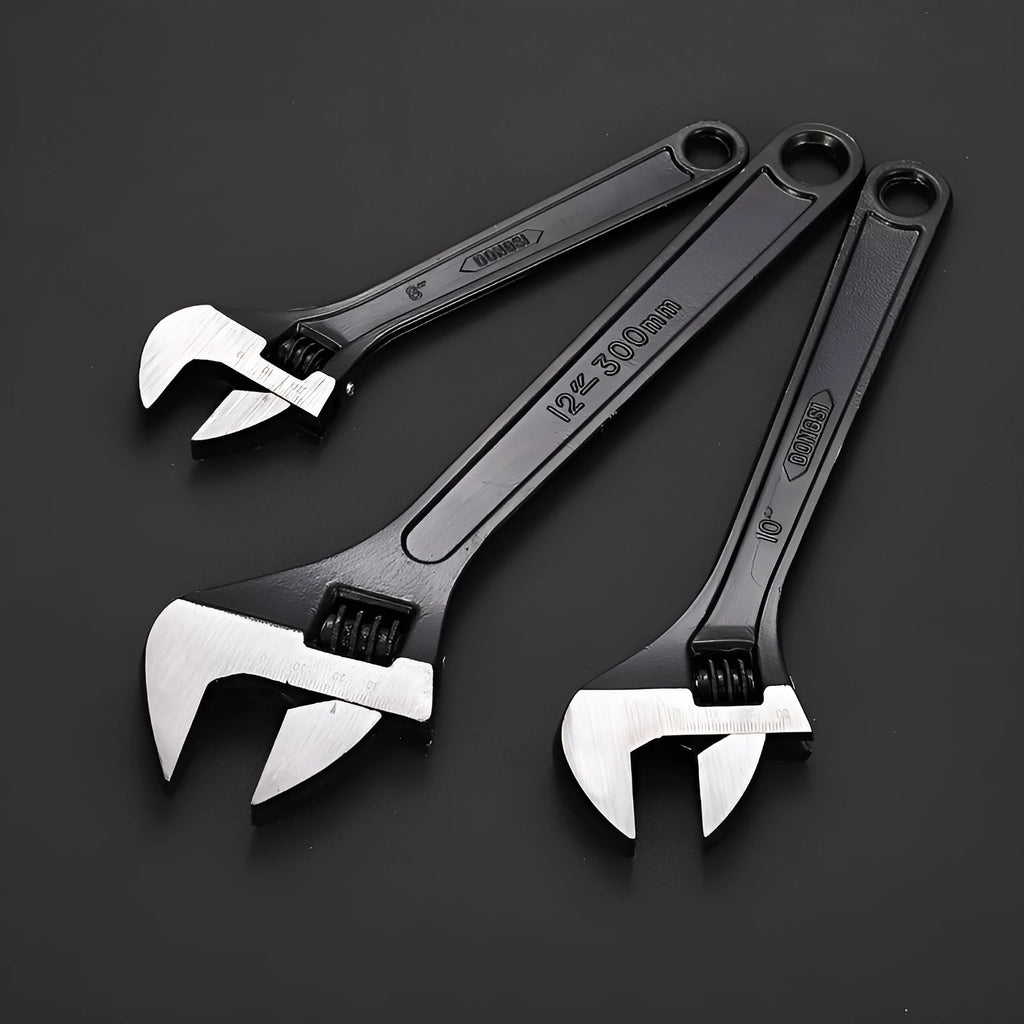 High-carbon steel adjustable spanner with black finish on a grey background.