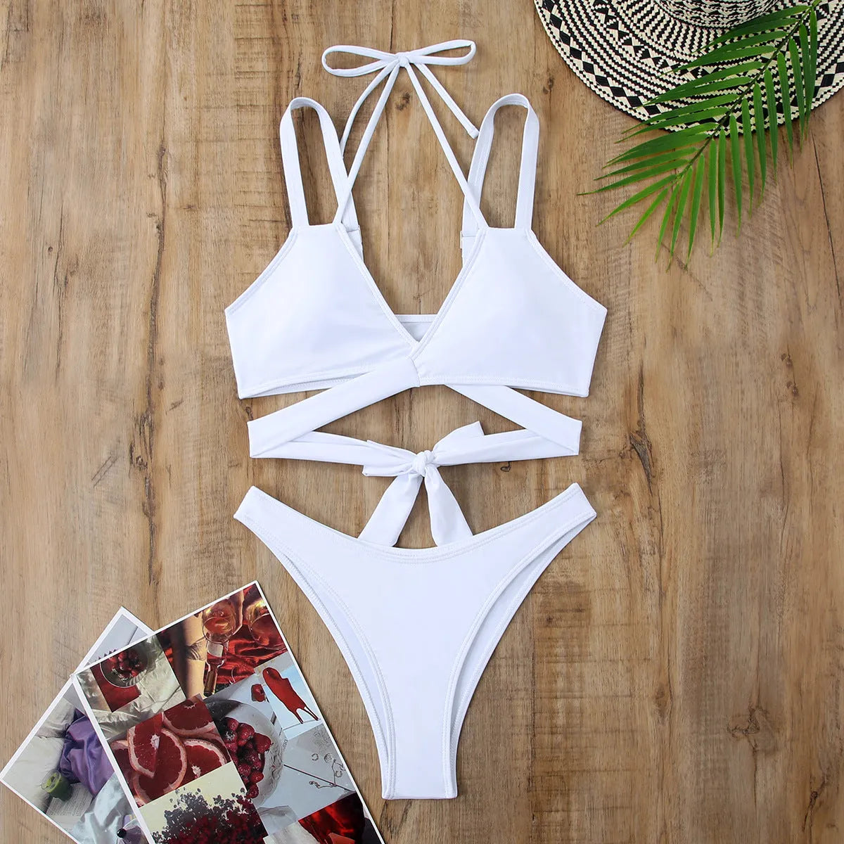 Women's solid colour strap bikini swimsuit showing briefs style and sleeveless design