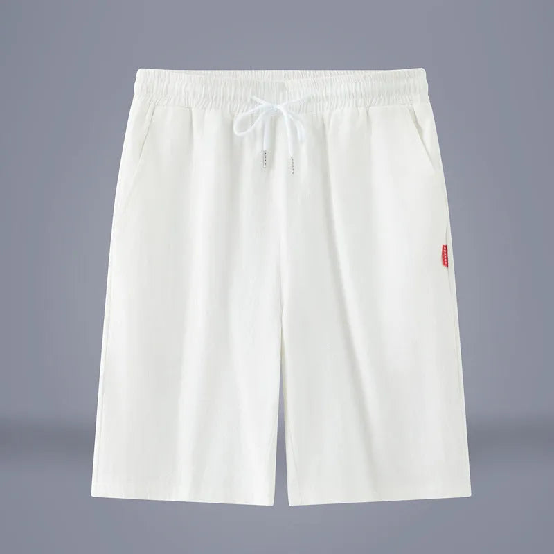 Cotton-linen cropped pants in solid colour with drawstring waist and mid-calf length