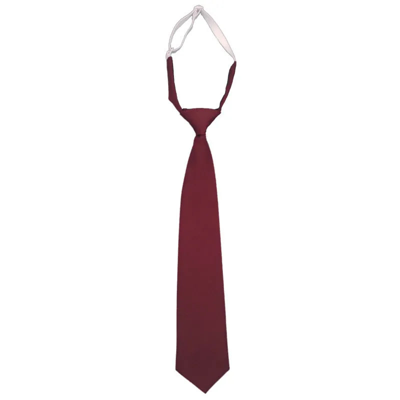 Men's solid colour cotton bow tie in arrow style, showing navy blue option.