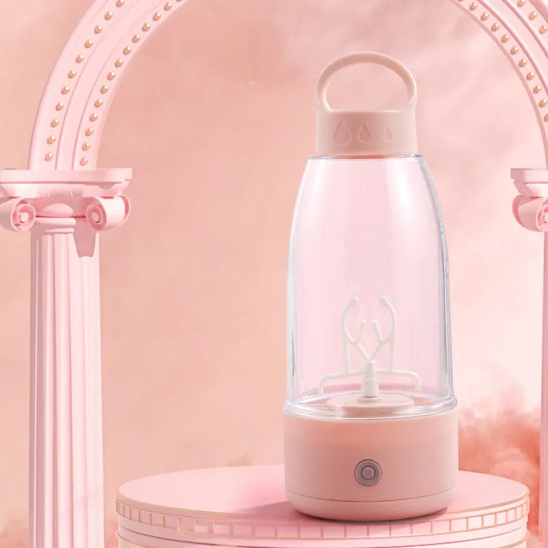 Automatic electric shaker bottle with USB charging port, handle, and blending button in green, pink, or white.