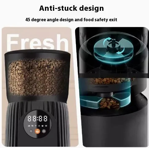Black automatic pet feeder with digital display and food container on kitchen counter