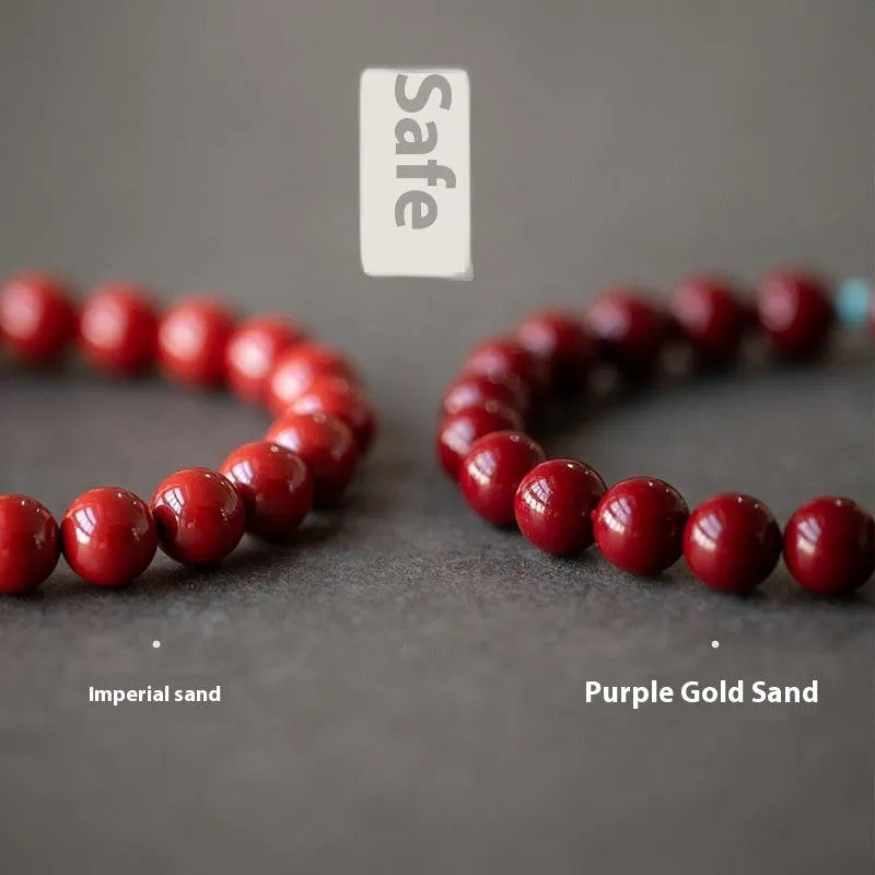 Purple Gold Sand cinnabar and Hetian jade bead bracelet with geometric ellipse shapes on a wrist.