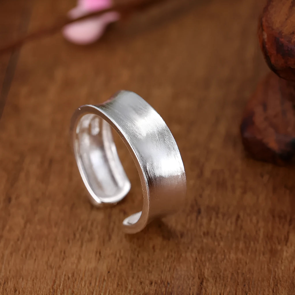 Geometric open ring in frosted sterling silver with adjustable opening