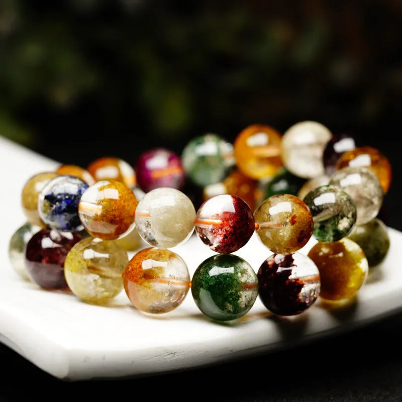 Ethnic style crystal bracelet with colourful ghost cornucopia beads, 10mm size, on an adjustable band.