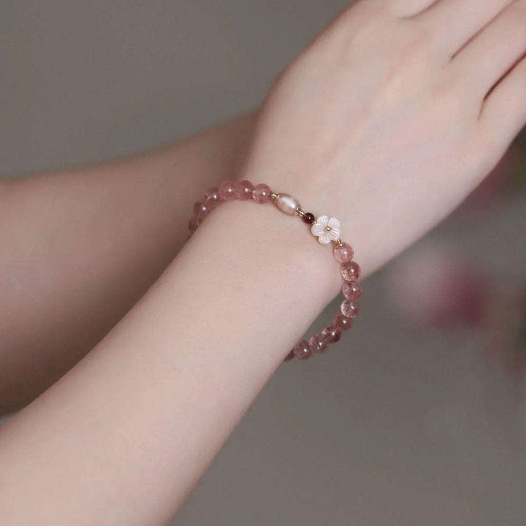 Strawberry quartz peach blossom bracelet with crystal flower design and adjustable fastening