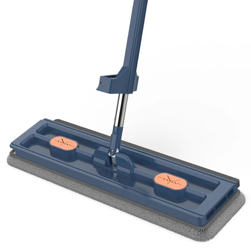 Large flat mop with long stainless steel handle and blue cloth on hard floor