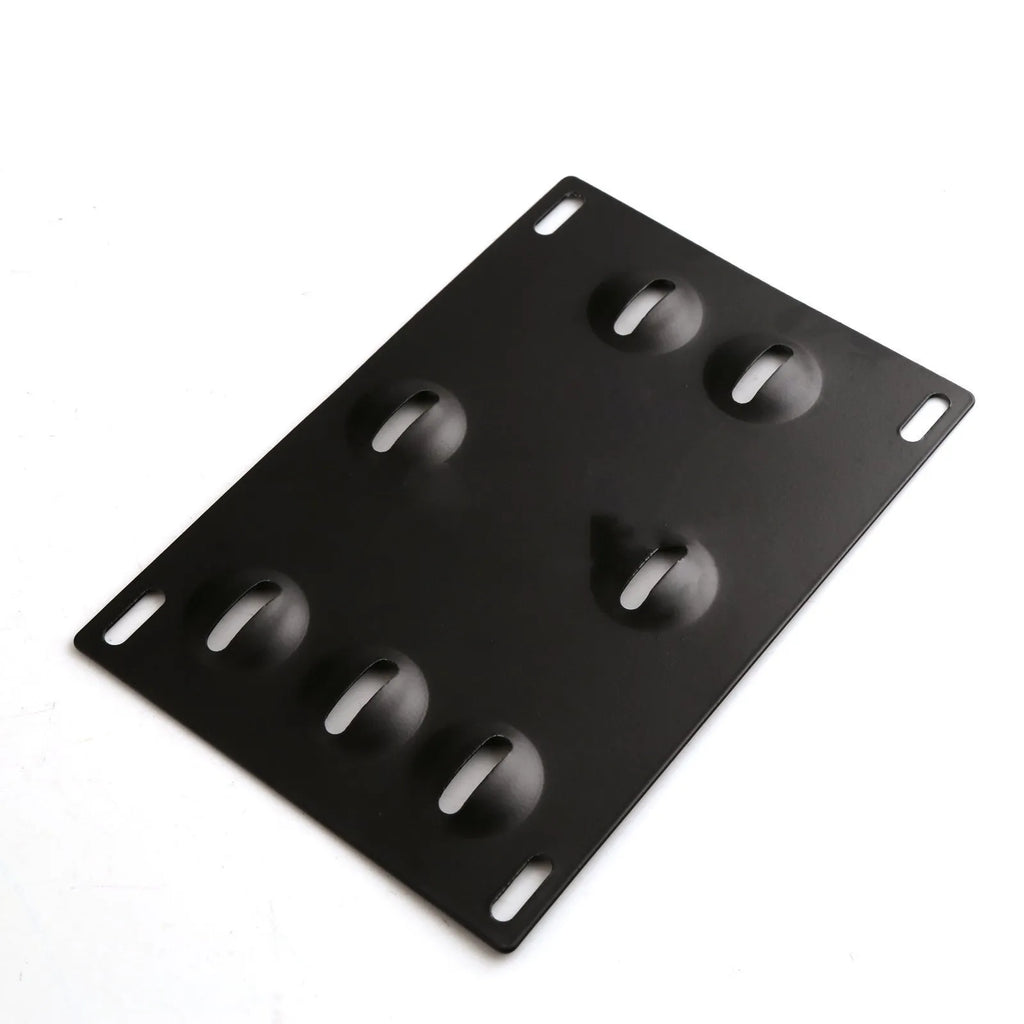Silver metal car licence plate frame with a central towing hook, next to screws and a nut.